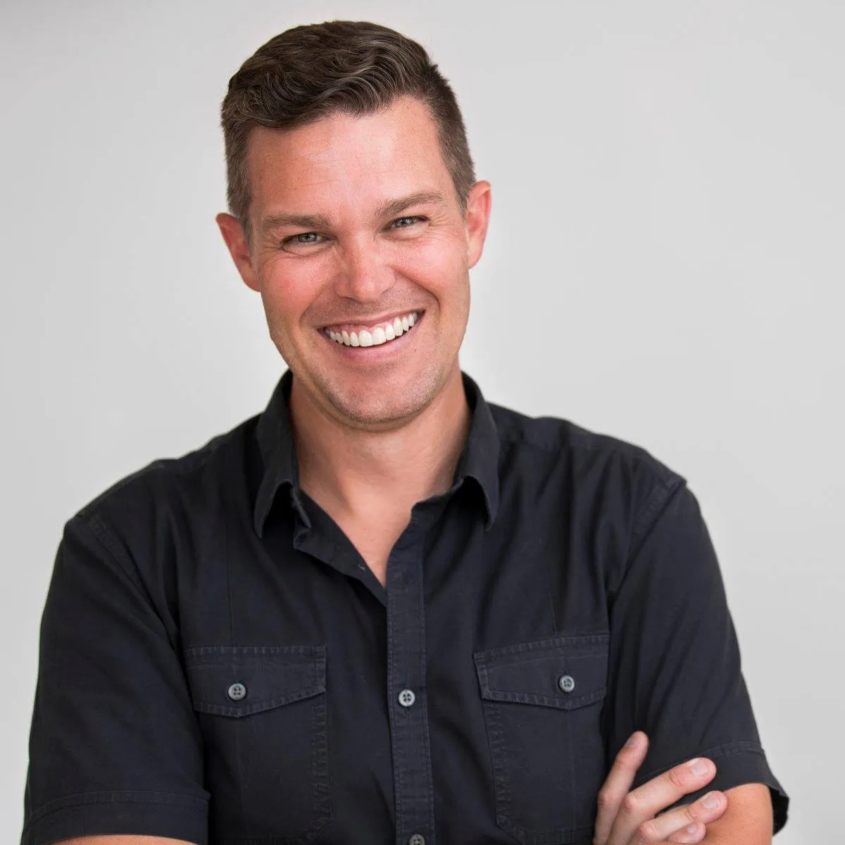 headshot of ryan beeken smiling